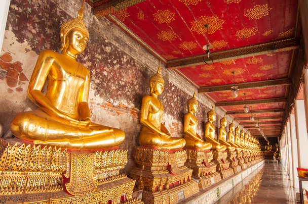 Seated buddhas in wat suthat,Bangkok,Thailand - Zdjęcie, obraz