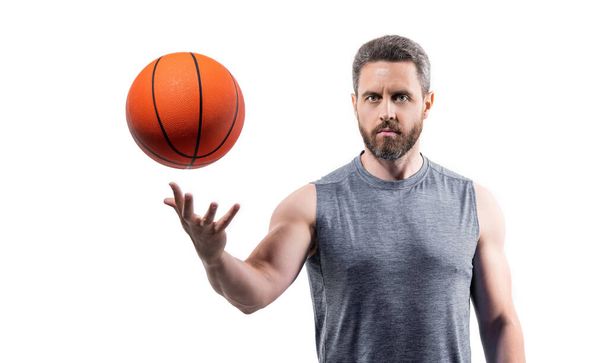sport man basketball player with ball in motion. sport man basketball player isolated on white background. sport man basketball player in studio. photo of sport man basketball player with ball. - Фото, изображение