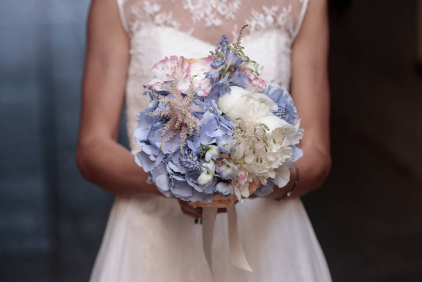 beautiful bouquet in the bride 's hand.  - Photo, image