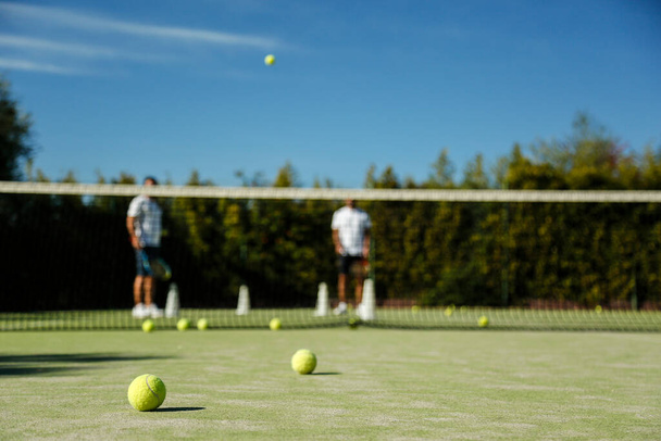 Tenis oynayan tenisçiler  - Fotoğraf, Görsel