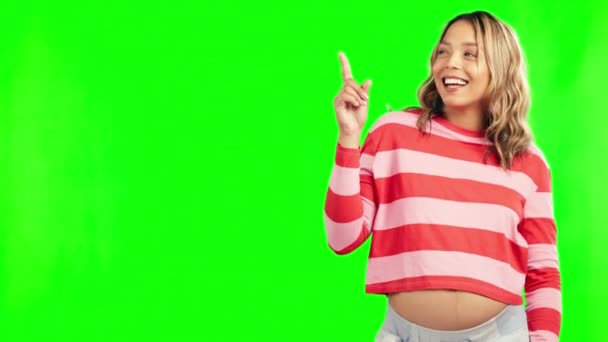 Studio, pointing or happy pregnant woman on green screen for promotion deal, sale offer or announcement. Pregnancy, maternity or mother to be smiling showing mockup space for advertising or marketing. - Footage, Video