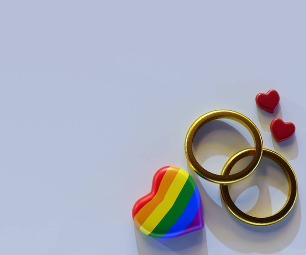 deux anneaux d'or avec coeur rouge et forme de coeur arc-en-ciel en arrière-plan rendu 3d - Photo, image