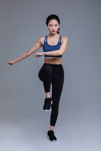 healthy beauty concept photo of korean asian beautiful woman running poses - Fotó, kép
