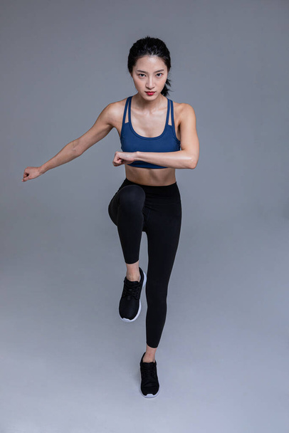 healthy beauty concept photo of korean asian beautiful woman running poses - Фото, изображение