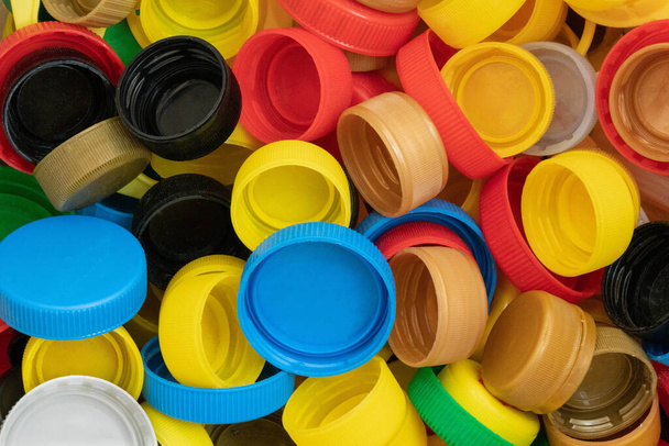 Multicolored plastic caps sorted at home, ready for recycling - Photo, Image