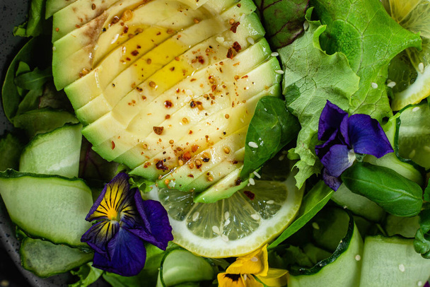 Salad of greens, avocado and cucumbers .Food styling - Fotoğraf, Görsel