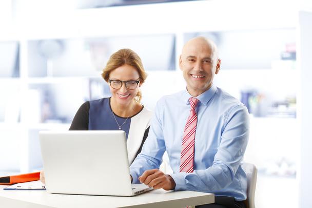 Businesswoman and businessman at office - Photo, Image