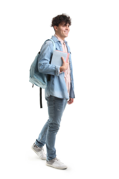 Male student with books on white background - Valokuva, kuva