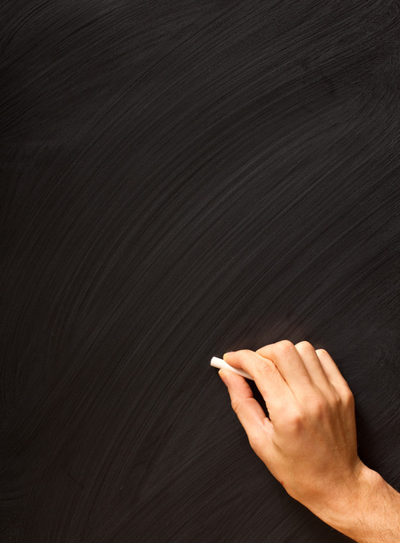 Hand writing on a blackboard - Photo, Image