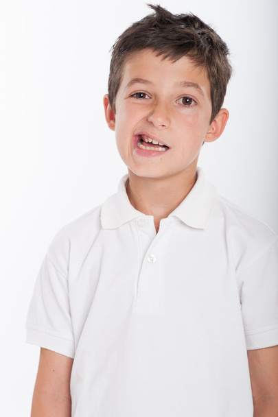 Young boy with funny expression - Foto, afbeelding