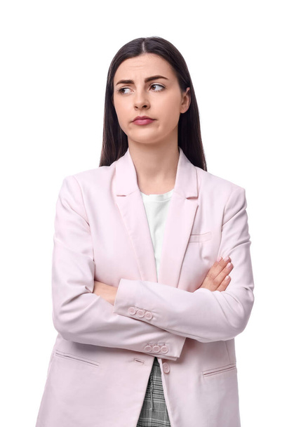 Beautiful young businesswoman crossing arms on white background - Φωτογραφία, εικόνα