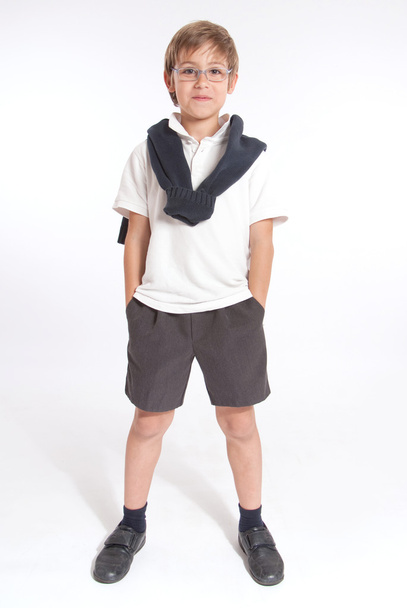Schoolboy with hands in pockets - Foto, afbeelding