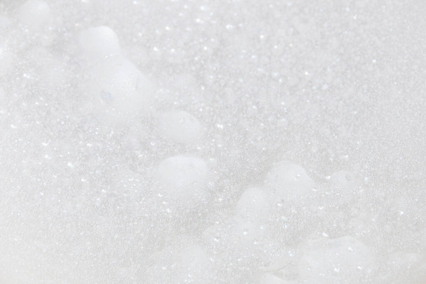 Soap bubbles.Abstract background white soapy foam texture.Shampoo foam with bubbles.Indoors shot. - Photo, Image