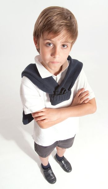 Schoolboy with crossed arms serious  - Photo, image