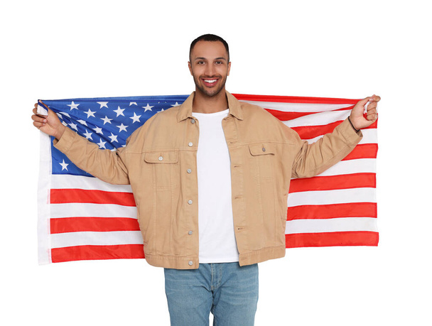 4th of July - Independence day of America. Happy man with national flag of United States on white background - Foto, immagini