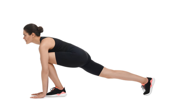 Woman stretching on white background. Morning exercise - Photo, Image