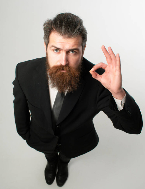 Funny handsome businessman in suit with ok sign wide angle. Business management. Great Idea - Foto, Imagem