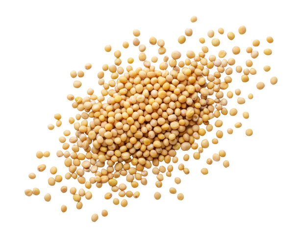 Heap of mustard grains scattered on white background. Top view - Foto, immagini