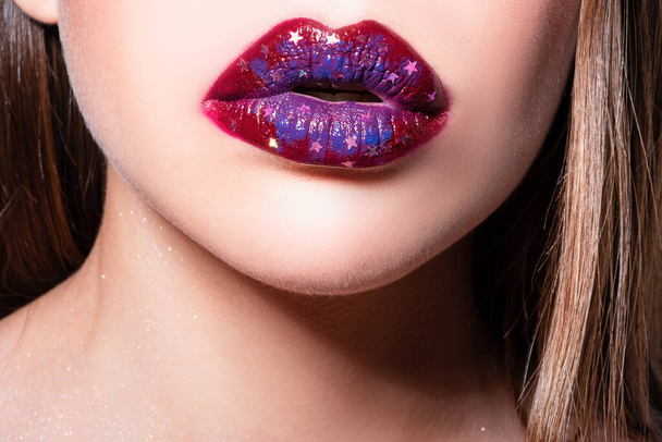 Female mouth with sexy pink lips isolated closeup. Close up woman sensual lips with red lipstick. Passionate lip. Creative abstract make-up - Photo, Image