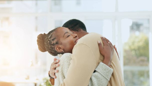 Black couple, dance together and hug in home with conversation, care and love with bonding. Man, woman and dancing with support, talking and romance with solidarity in house with trust in partnership. - Foto, Imagem