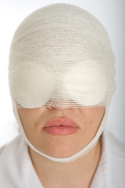 Woman with bandaged face - Fotoğraf, Görsel