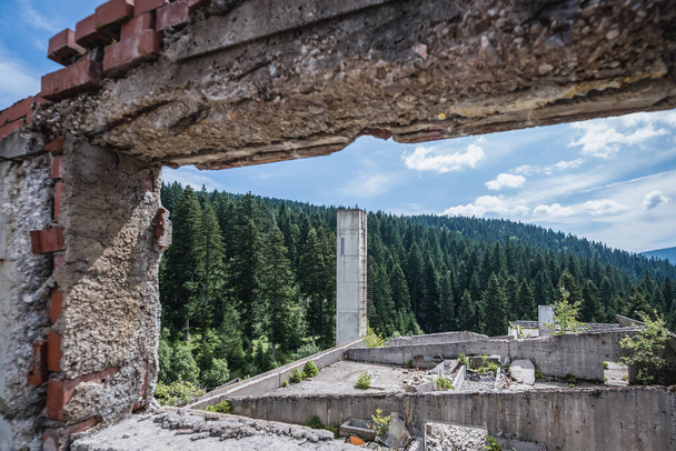 Remains of Igman Hotel destroyed during Bosnia War near Igman Olympic Jumps, Bosnia and Herzegovina - Photo, Image