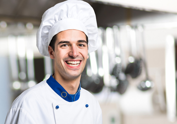 Portrait of a Chef in his Kitchen - Foto, afbeelding
