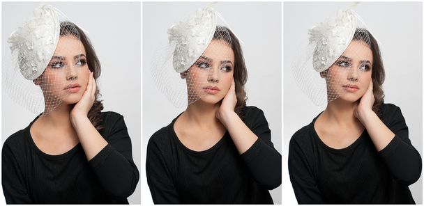 Hairstyle and make up - beautiful young girl art portrait. Cute brunette with white cap and veil, studio shot. Attractive female with beautiful lips and eyes in black blouse, over white - Photo, Image