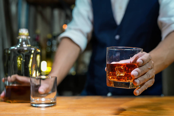 Bartender Serve Whiskey, on wood bar,  - Fotó, kép