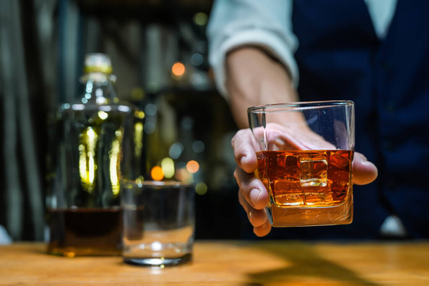 Bartender Serve Whiskey, on wood bar, - Fotoğraf, Görsel