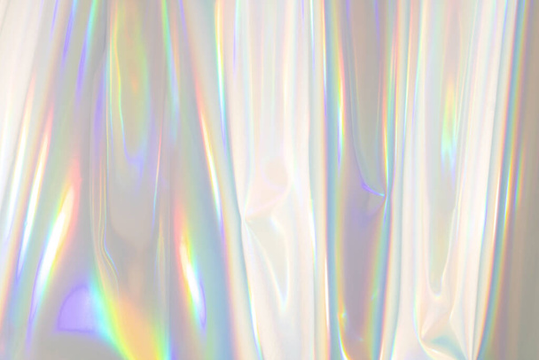 虹色の背景。ホログラフィック抽象的な柔らかいパステルカラーの背景。ホログラフィックフォイルの背景。トレンディなクリエイティブグラデーション. - 写真・画像