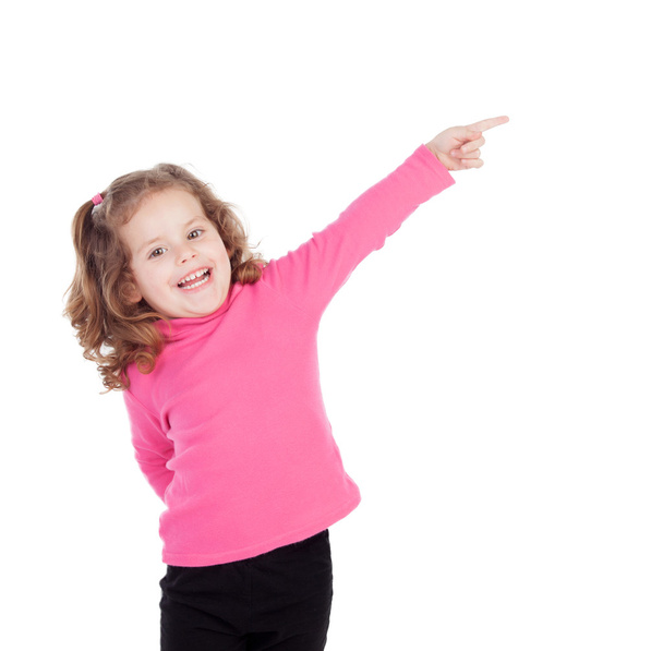 Κοριτσάκι σε ροζ χρώμα που δείχνει κάτι - Φωτογραφία, εικόνα