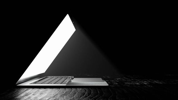 Ein Laptop-Bildschirm mit Leuchten auf dunklem Hintergrund - Foto, Bild
