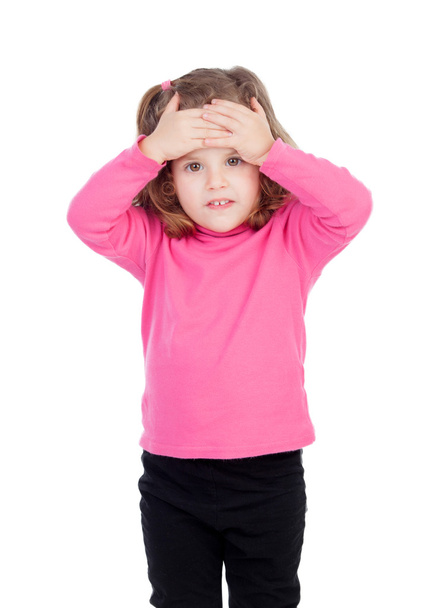 Worried little girl in pink - Фото, изображение
