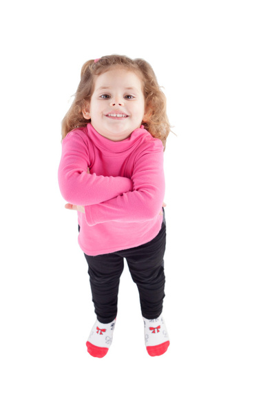 Cute little girl in pink with arms crossed  - 写真・画像