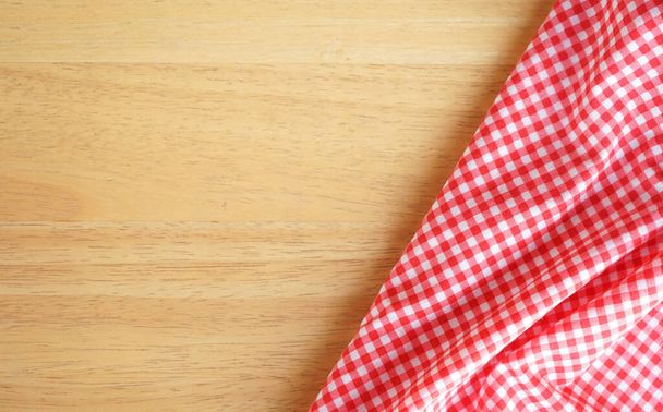kitchen cloth ( napkin ) on wood background with space for copy  - Photo, Image