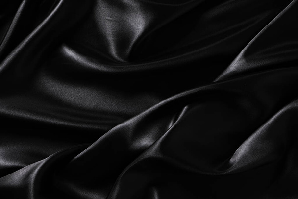 Silk fabric, abstract wavy black satin fabric background - Fotoğraf, Görsel