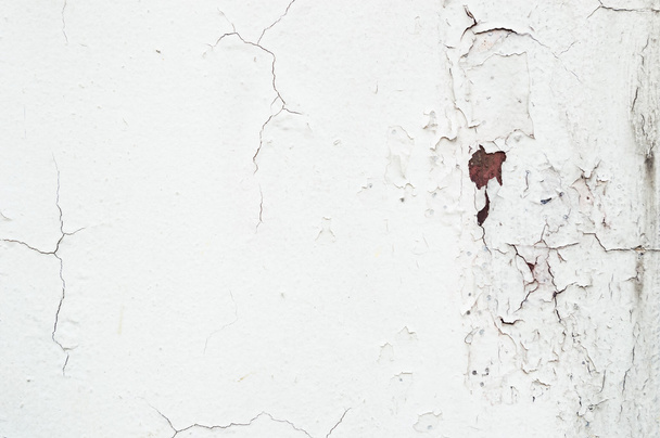 ένα παλιό βρώμικο τσιμεντένιος τοίχος με ένα σκουριά και ρωγμές - Φωτογραφία, εικόνα