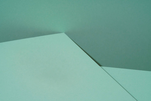 Барвистий фон з зеленого паперу з тіні. Абстрактний геометричний
 - Фото, зображення