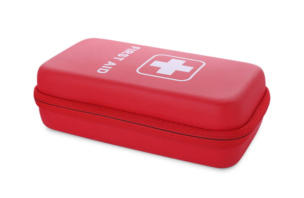 Red first aid kit isolated on white - Foto, afbeelding
