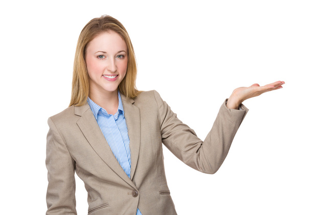 Caucasian businesswoman in beige suit - Photo, Image