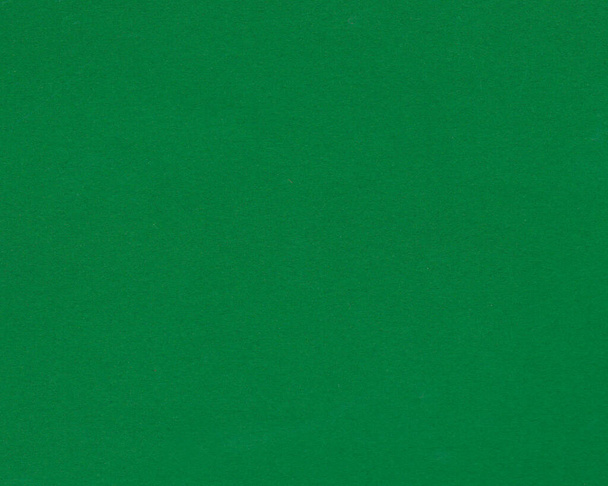 Green colored paper surface texture. Abstract background - Photo, Image