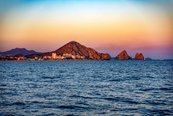 Beautiful sunset from the town of Cape Saint Luke in the Gulf of California that separates the Sea of Cortez from the Pacific Ocean in Baja California Sur, Mexico. Sunset concept. - Фото, зображення