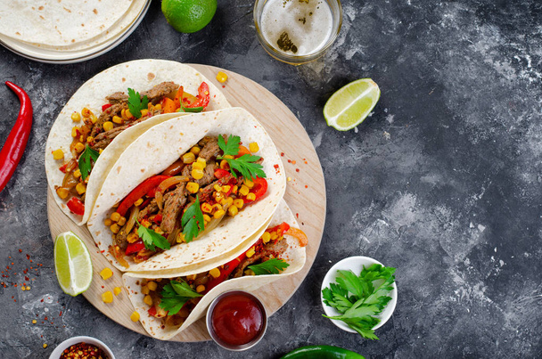 Mexican Tacos with Beef and Vegetables, Tacos al Pastor on Dark Rustic Background - Photo, Image