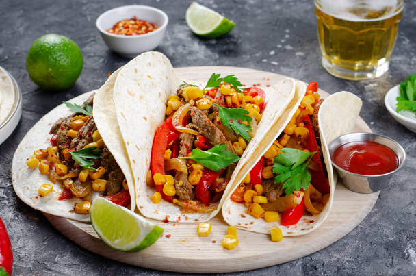 Mexican Tacos with Beef and Vegetables, Tacos al Pastor on Dark Rustic Background - Foto, Imagen