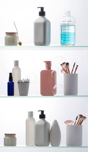 A set of cosmetics for the care and youth of the skin on a glass shelf. Layouts with a place for your logo. Skin care. Copy space - Foto, imagen