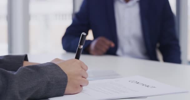Interview, contract and a human resources manager signing paper in the office during a hiring or recruitment meeting. Management, documents and agreement with hr business people in the boardroom. - Footage, Video