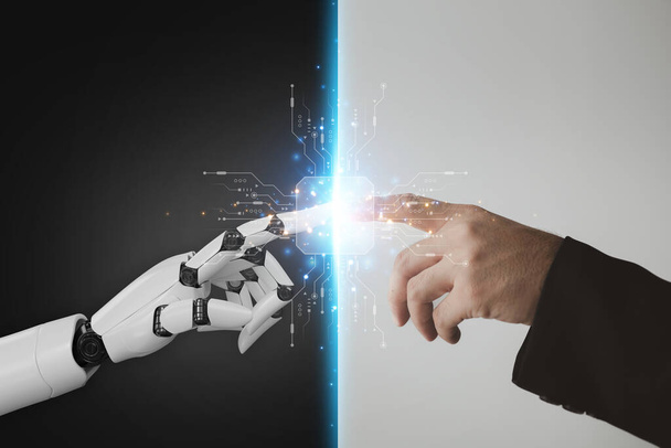 Robot and human hands pointing to each other, the idea of creating futuristic AI, intelligent systems to work instead of humans and do what humans can't. Creating innovative technology of the future. - 写真・画像