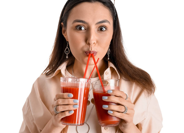 Young woman drinking vegetable juice on white background, closeup - Fotoğraf, Görsel
