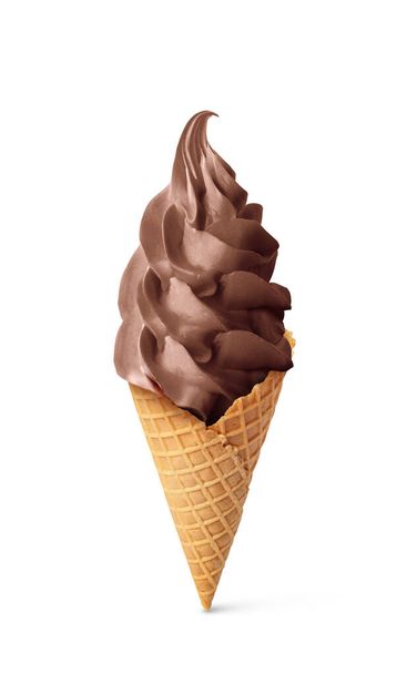 Delicious soft serve chocolate ice cream in crispy cone isolated on white - 写真・画像